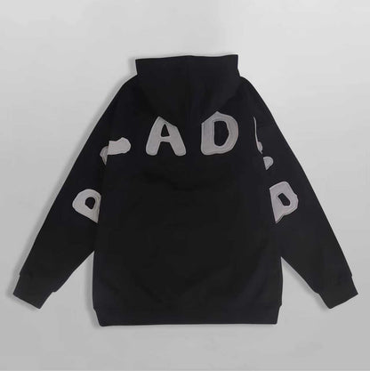Black hoodie with white branding on a light gray background showing the logo of the brand Baladeur